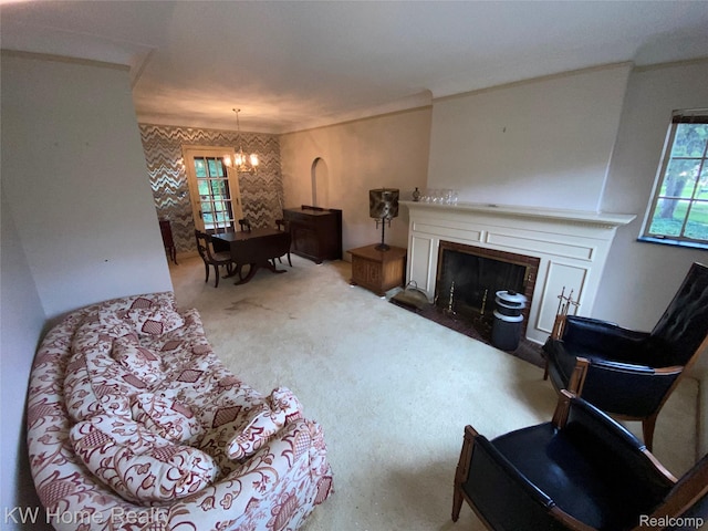 27943 Sunset Blvd W, Lathrup Village, MI 48076 - carpeted living area with a chandelier and a fireplace with flush hearth