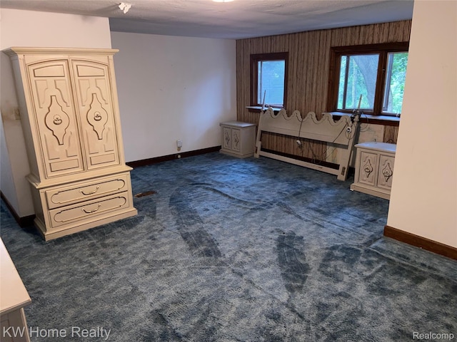 27943 Sunset Blvd W, Lathrup Village, MI 48076 - unfurnished bedroom with dark colored carpet