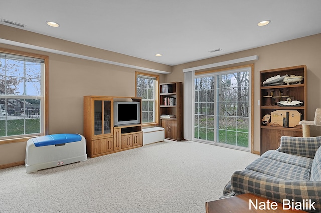 7165 Keystone Ct, Jenison, MI 49428 - carpeted living room with recessed lighting and baseboards