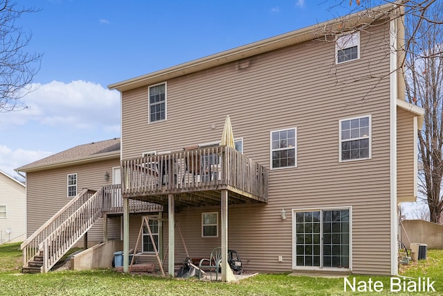 7165 Keystone Ct, Jenison, MI 49428 - back of property featuring a wooden deck, stairway, a yard, and central AC unit