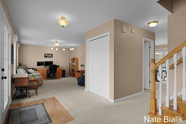 7165 Keystone Ct, Jenison, MI 49428 - foyer with carpet floors, stairs, and baseboards