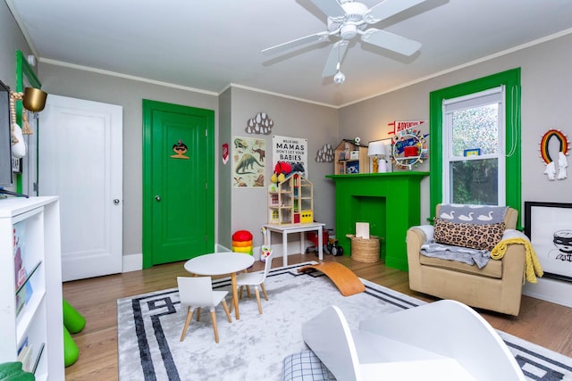 953 Berkshire Rd, Grosse Pointe Park, MI 48230 - game room featuring wood finished floors, crown molding, and a ceiling fan