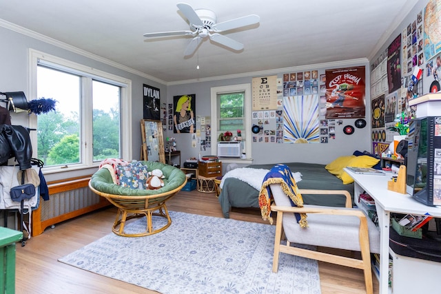 953 Berkshire Rd, Grosse Pointe Park, MI 48230 - bedroom featuring ornamental molding, wood finished floors, and multiple windows