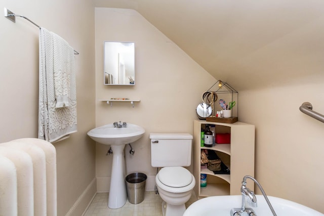 953 Berkshire Rd, Grosse Pointe Park, MI 48230 - bathroom featuring lofted ceiling, toilet, and baseboards