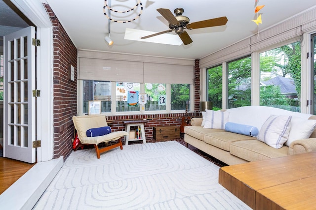 953 Berkshire Rd, Grosse Pointe Park, MI 48230 - sunroom with brick wall and wood finished floors