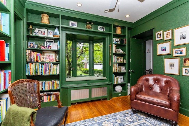 953 Berkshire Rd, Grosse Pointe Park, MI 48230 - sitting room with ornamental molding, ceiling fan, wood finished floors, and radiator heating unit