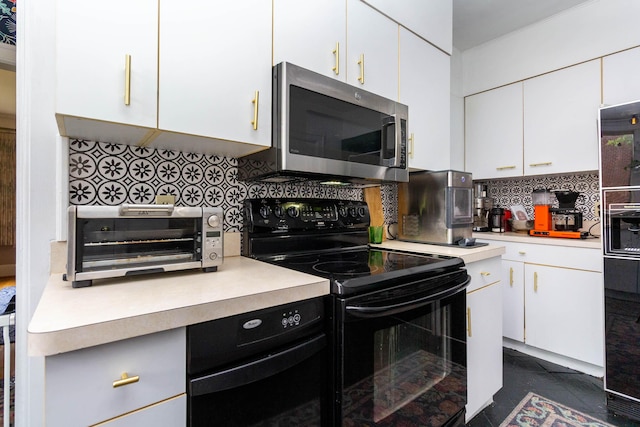 953 Berkshire Rd, Grosse Pointe Park, MI 48230 - kitchen featuring black electric range, stainless steel microwave, light countertops, and backsplash