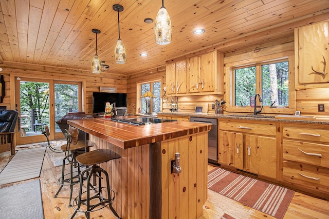 1547 N Dennis Rd, Ludington, MI 49431 - kitchen with wood counters, stainless steel dishwasher, wooden ceiling, electric stovetop, and light wood-style floors