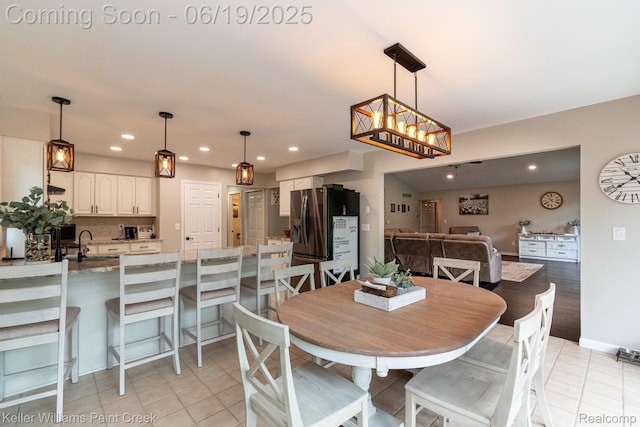 75757 Peters Dr, Bruce, MI 48065 - dining area featuring recessed lighting and light tile patterned flooring