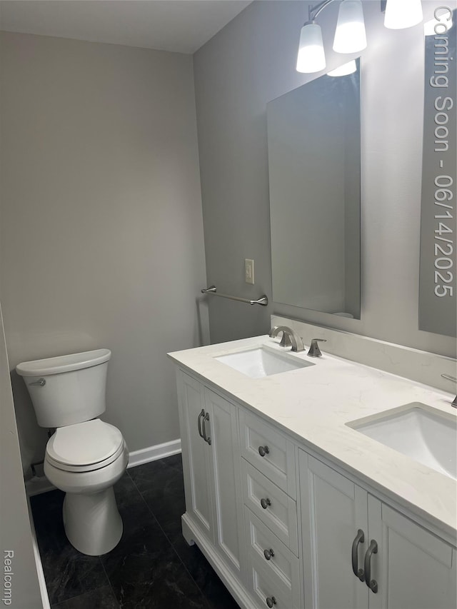 2145 Terrapin St, Wolverine Lake, MI 48390 - bathroom featuring toilet and double vanity