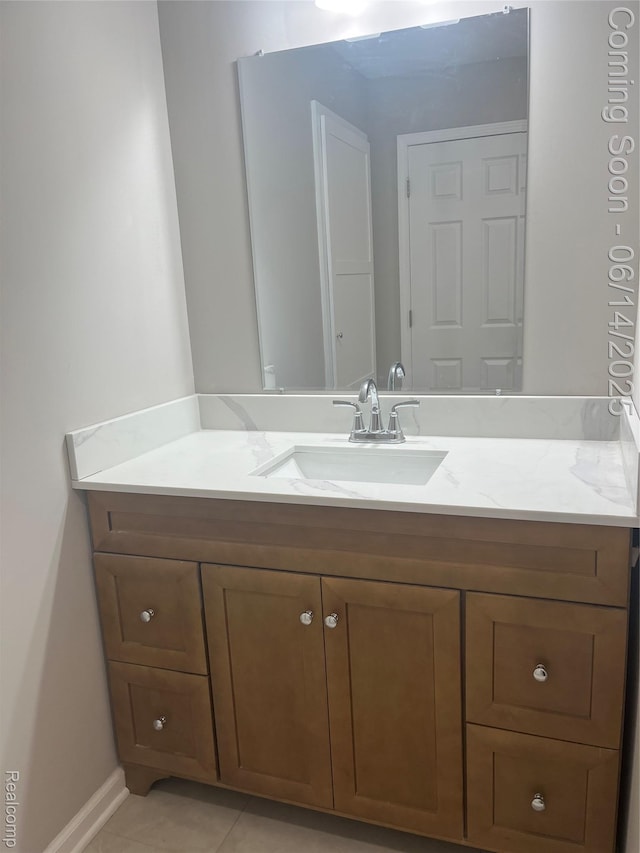 2145 Terrapin St, Wolverine Lake, MI 48390 - bathroom featuring vanity and tile patterned flooring