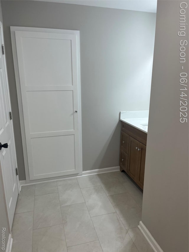 2145 Terrapin St, Wolverine Lake, MI 48390 - bathroom featuring vanity and tile patterned floors