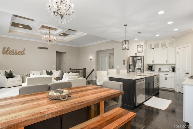 50035 Anita Way N, Macomb, MI 48044 - kitchen featuring stainless steel appliances, a chandelier, ornamental molding, recessed lighting, and a sink