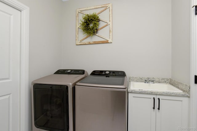 50035 Anita Way N, Macomb, MI 48044 - laundry area featuring washing machine and clothes dryer and cabinet space