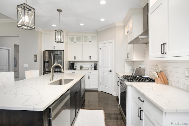 50035 Anita Way N, Macomb, MI 48044 - kitchen featuring stainless steel appliances, wall chimney exhaust hood, a sink, recessed lighting, and an island with sink