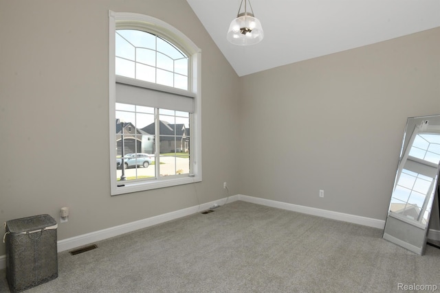 50035 Anita Way N, Macomb, MI 48044 - empty room with carpet, a chandelier, baseboards, and high vaulted ceiling