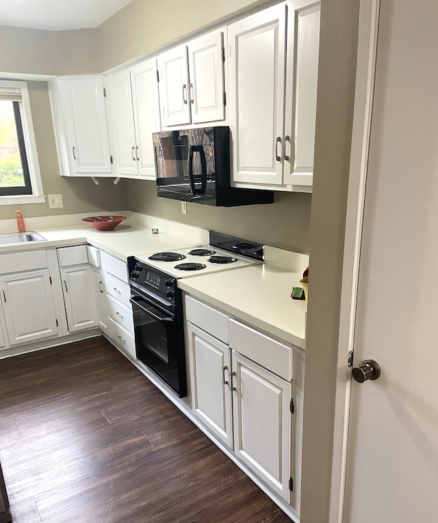 2165 Pauline Ct, Ann Arbor, MI 48103 - kitchen featuring electric range oven, black microwave, white cabinets, and light countertops