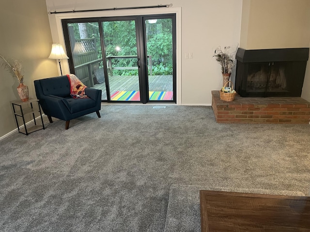2165 Pauline Ct, Ann Arbor, MI 48103 - living area featuring carpet, a fireplace, and baseboards