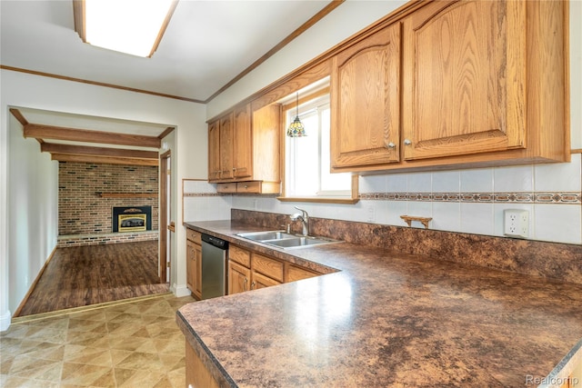 3460 N Gale Rd, Davison, MI 48423 - kitchen featuring a sink, dark countertops, crown molding, dishwasher, and decorative backsplash