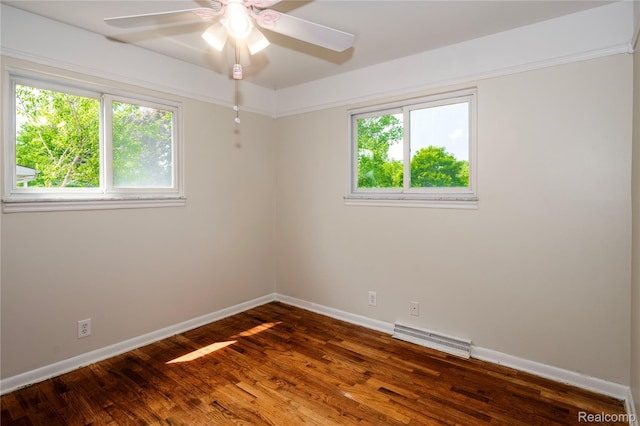 3460 N Gale Rd, Davison, MI 48423 - empty room with baseboards, dark wood-style flooring, and a ceiling fan