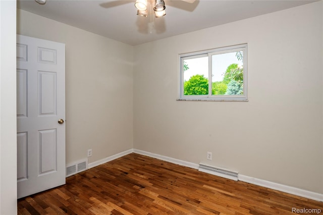 3460 N Gale Rd, Davison, MI 48423 - empty room featuring a ceiling fan, dark wood-type flooring, and baseboards