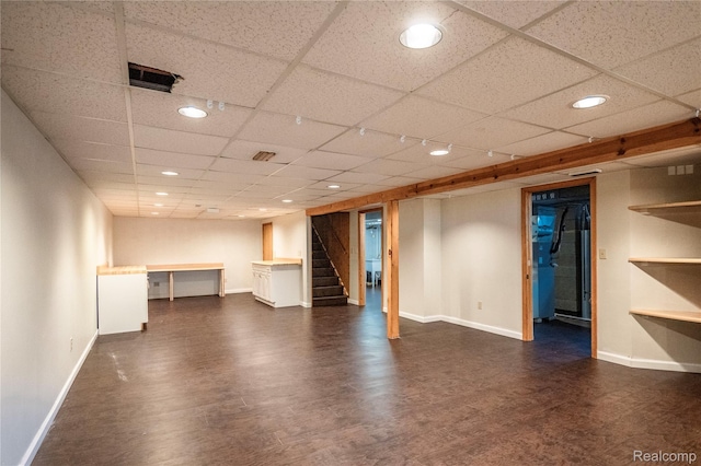3460 N Gale Rd, Davison, MI 48423 - finished below grade area with baseboards, dark wood finished floors, a drop ceiling, stairway, and recessed lighting