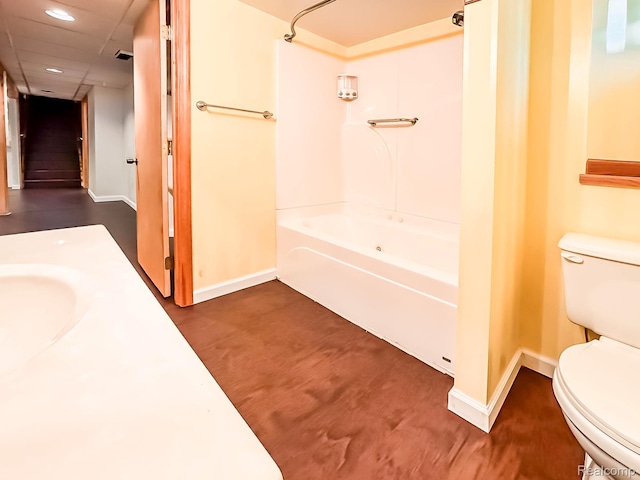 3460 N Gale Rd, Davison, MI 48423 - full bathroom with toilet, shower / bathtub combination, baseboards, vanity, and recessed lighting
