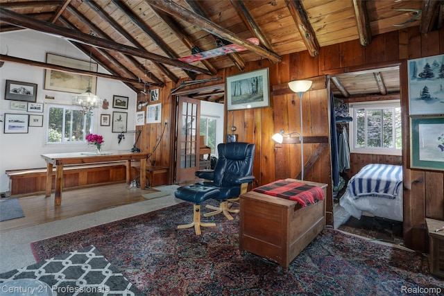 9233 Evee Rd, Clarkston, MI 48348 - sitting room with wooden ceiling, wooden walls, and a chandelier