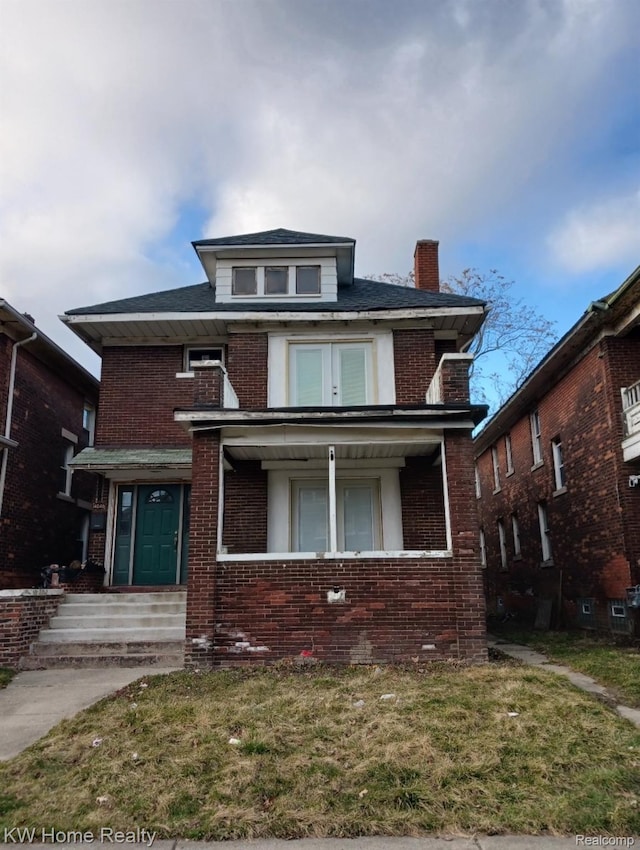 4046 Pingree St, Detroit, MI 48204 - traditional style home with brick siding, a chimney, a front yard, and a porch