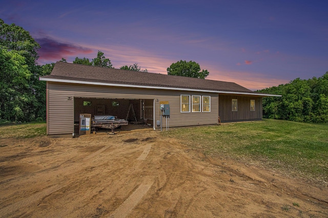89492 County Road 690, Benton Harbor, MI 49022 - view of front of home featuring a garage and a front lawn