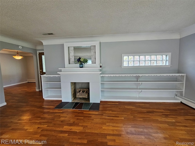 7257 Miller Rd, Swartz Creek, MI 48473 - unfurnished living room with arched walkways, wood finished floors, a textured ceiling, a fireplace with flush hearth, and baseboards