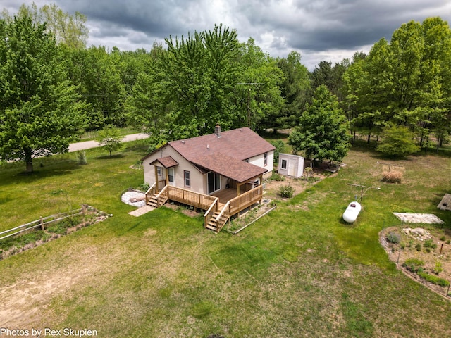 3118 W 104th St, Grant, MI 49327 - view from above of property featuring a heavily wooded area