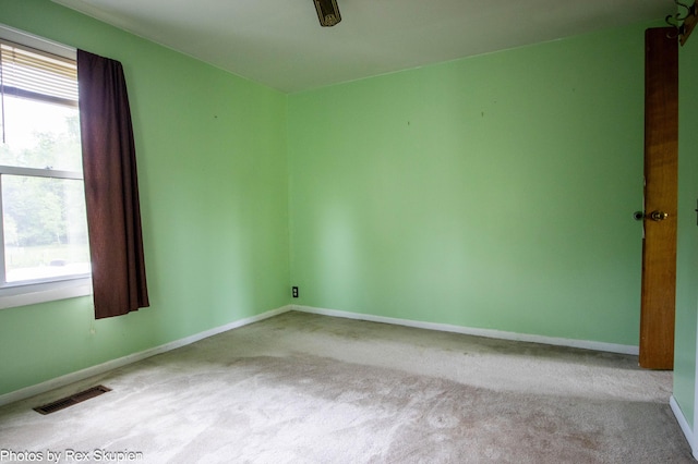 3118 W 104th St, Grant, MI 49327 - empty room with carpet flooring and baseboards