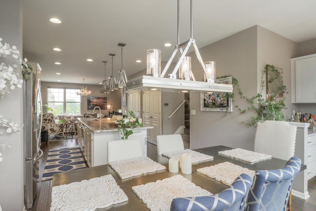 2605 Helmsdale Cir, Rochester, MI 48307 - dining space with stairway, recessed lighting, dark wood-style flooring, and a chandelier
