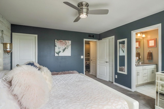 2605 Helmsdale Cir, Rochester, MI 48307 - bedroom with connected bathroom, carpet floors, ceiling fan, and baseboards