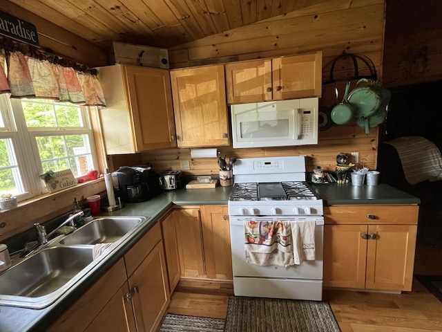 32480 W Old Chip Rd, Paradise, MI 49768 - kitchen featuring white appliances, light wood finished floors, wooden ceiling, and wood walls