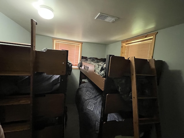 32480 W Old Chip Rd, Paradise, MI 49768 - bedroom featuring lofted ceiling