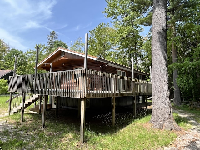 32480 W Old Chip Rd, Paradise, MI 49768 - back of house with stairs and a deck