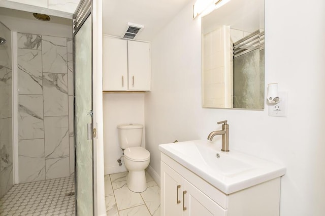6604 E H Ave, Kalamazoo, MI 49048 - bathroom with marble look tiles, vanity, a marble finish shower, toilet, and baseboards