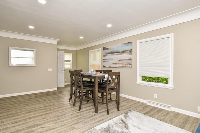 6604 E H Ave, Kalamazoo, MI 49048 - dining area featuring wood finished floors, recessed lighting, baseboards, and crown molding
