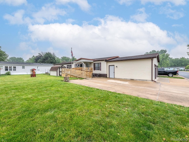 285 Heather, Temperance, MI 48182 - rear view of house with a lawn