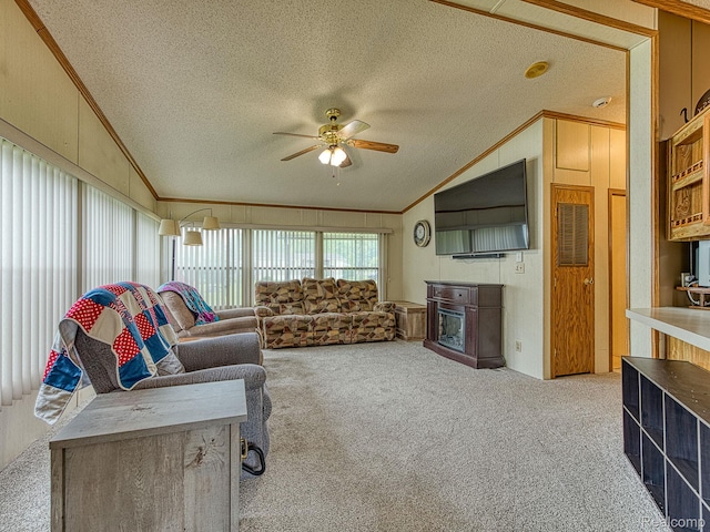 285 Heather, Temperance, MI 48182 - living room with crown molding, carpet flooring, vaulted ceiling, ceiling fan, and a textured ceiling