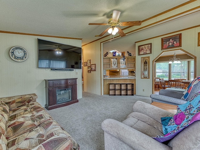 285 Heather, Temperance, MI 48182 - living area with ornamental molding, ceiling fan, carpet flooring, a textured ceiling, and a glass covered fireplace