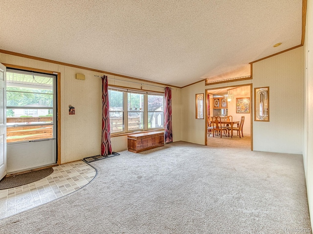 285 Heather, Temperance, MI 48182 - unfurnished living room with ornamental molding, a textured ceiling, lofted ceiling, and carpet floors