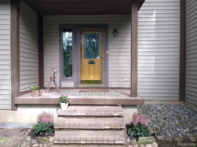1455 Sand Rd, Port Austin, MI 48467 - entrance to property featuring a porch