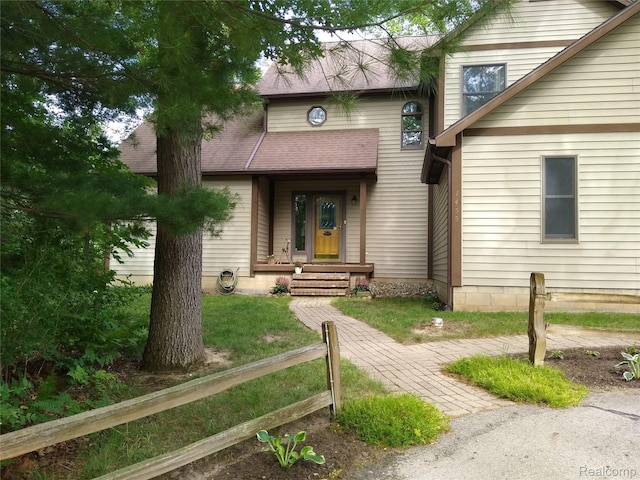 1455 Sand Rd, Port Austin, MI 48467 - view of front of house with a shingled roof