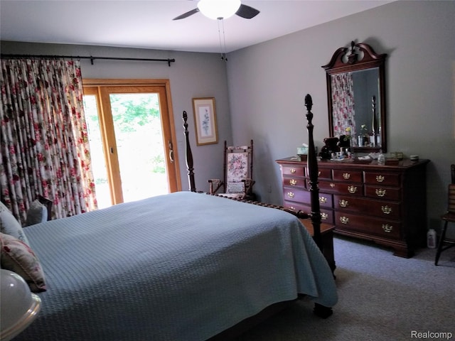 1455 Sand Rd, Port Austin, MI 48467 - carpeted bedroom with access to exterior and a ceiling fan
