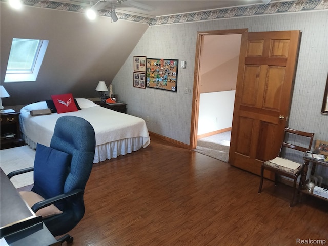 1455 Sand Rd, Port Austin, MI 48467 - bedroom featuring wallpapered walls, wood finished floors, and a skylight