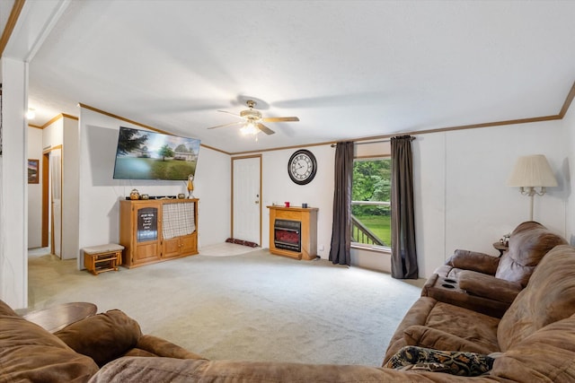 7100 Tripp Rd, Horton, MI 49246 - living area with ornamental molding, light colored carpet, a ceiling fan, and a fireplace