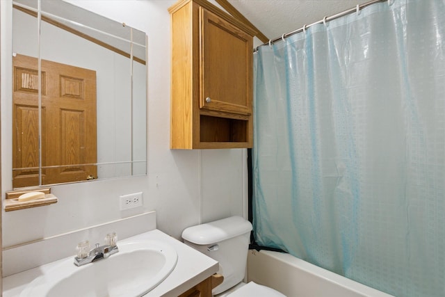 7100 Tripp Rd, Horton, MI 49246 - bathroom with vanity, toilet, shower / bathtub combination with curtain, and a textured ceiling